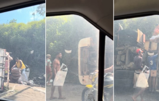 Carga de frango é saqueada após carreta tombar na BR-101, no sul da Bahia